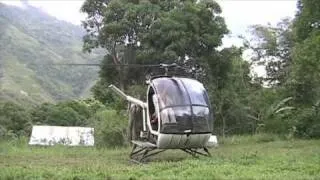 Flying a Medevac / Supply Hughes 269 piston helicopter around the small islands in the Philippines