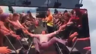 Alex Turner lifted by fans in the middle of his performance (TLSP-2016)