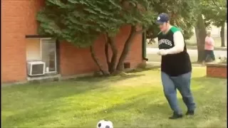 Fat guy fails at kicking ball
