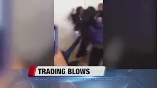 Disturbing brawl at high school caught on camera