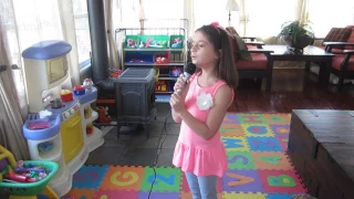 My 7 year old singing karaoke to 'How far I'll go'.