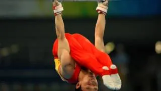 Chinas Zou Defends mens Floor Exercise Gold