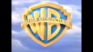 Warner Bros and Odyssey Entertainment logos 2004 Audio Descriptive