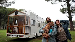 CARAVAN CAMP IN THE RAIN IN THE PINE FOREST