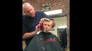 Barber Pranks Kid By Pretending He's Cut His Ear Off #shorts