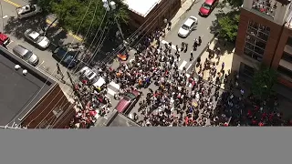 Drone Video Shows Moment Car Plows into Protests