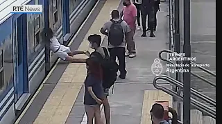 Woman survives fall in front of moving train in Argentina