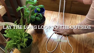 How to make a plant hanger from rope.