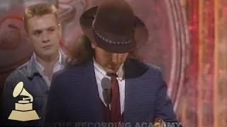 U2 accepting the GRAMMY for Best Rock Performance by a Duo or Group at the 30th GRAMMYs | GRAMMYs