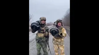 Ukrainian Soldiers show off their NLAW Rocket Launchers