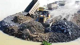 Incredible Bulldozer And Dump Truck Building New Road Over Big Lake Dozer Pushing Stone Into Water