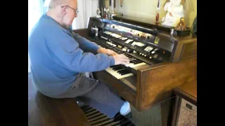 Mike Reed plays a Latin style "White Christmas" on the Hammond Organ