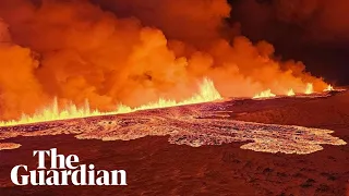 Aerial footage shows Iceland volcano spewing lava