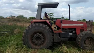 o trator chegou pra limpar o açude pra nois pescar