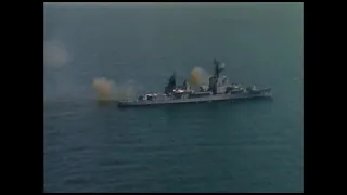 USS Orleck (DD-886) firing on a Viet Cong stronghold near City of Vung Tau in South Vietnam.