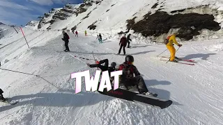 Snowboarder taking out a skier