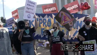 "Progressive Anti-Abortion Uprising" group counters pro-choice activists outside Supreme Court