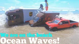 The Ocean Waves are Hitting the TOY TRUCKS! UPS Delivery Toy Trucks on the BEACH. Kids' Toys