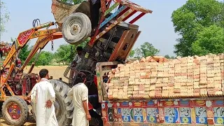 Tractor accident occurred while pulling a trolley on the road under construction