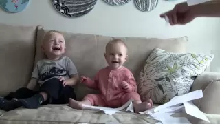 Baby Laughing Hysterically at Ripping Paper with Little Sister