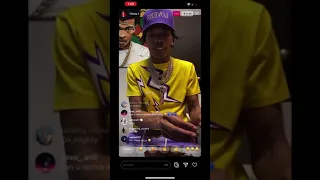 Lil baby Instagram live showing how to roll up backwoods