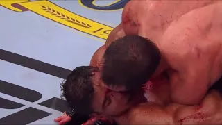 Luke Rockhold smears blood on Costa