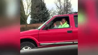 Driver's racist taunting following road rage incident caught on camera