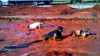 Warrior Dash 2012/ Our Trainer Marcus in the mudd pool