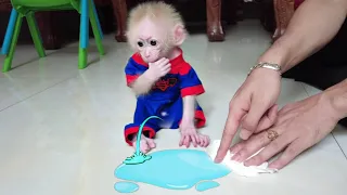 Baby monkey AKA peed the clothes Dad just bought so wet