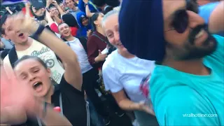 Fans celebrating at Moscow Fan Fest as Russia qualifies for Quarterfinals of FIFA World Cup 2018