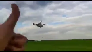 Twin Ukrainian Mi-24 attack helicopters fire NURS rockets at Russian targets