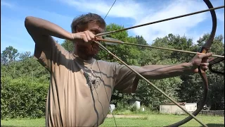 Archery - Thumb draw, fast shooting technique, three arrows in draw hand