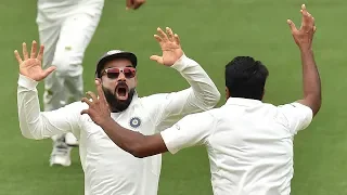 India celebrate after taking final wicket
