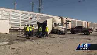 Video shows train slamming into tractor-trailer stopped on South Carolina railroad tracks