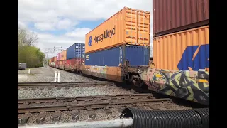 NS 276 at the Marion Union Station in Marion Ohio with a WFRX Locomotive Trailing