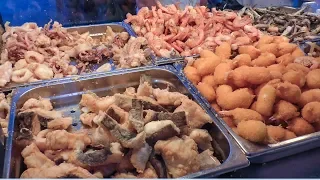 Italy Street Food. Orgy of Fried Fish, Seafood, Paella