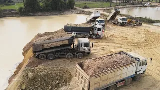 Ingenious Dump Truck's Driver Operator Skills Unloading Dirt on Construction and Bulldozer Pushing