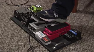 Michael Landau shows his pedalboard around 2007