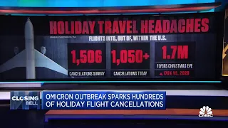 Omicron outbreak sparks hundreds of holiday flight cancellations
