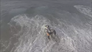 Surf launching jetskis and boats from Ballito Ski Boat Club South Africa