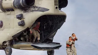 US Soldiers Jump Into Water From Massive CH-47 Chinook Helicopter