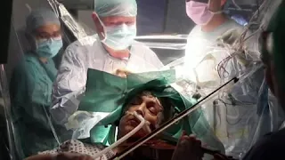 Patient plays the violin during brain surgery to remove tumor | ABC News