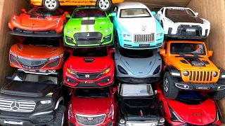 Box Full of Model Cars Koenigsegg Jesko, Honda Civic, Nissan GTR R35, Lamborghini Sian, McLaren 720s