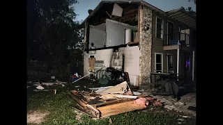 Woman says explosion in neighbor’s apartment knocked her across the room