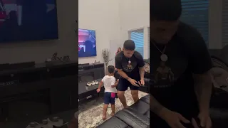 Mom catches dad and son throwing money at girls dancing on tv #shorts