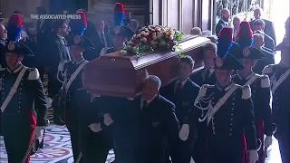 Tens of thousands attend Berlusconi's funeral