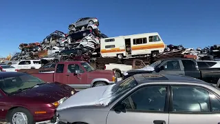 JUNKED!  The Junkyard Wall Of Cars!  Let's take a walk along this huge grab bag of junked cars!