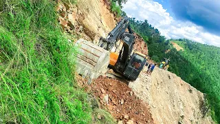 Highly Risky Mountain Road Construction with Excavator: Watch the Breathtaking Video Here