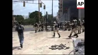 Police fire tear gas at Chavez supporters