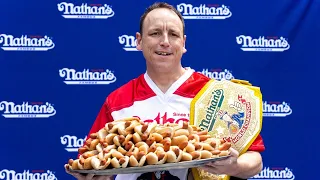 Hot dog eating champion devours over 60 hot dogs in 10 minutes